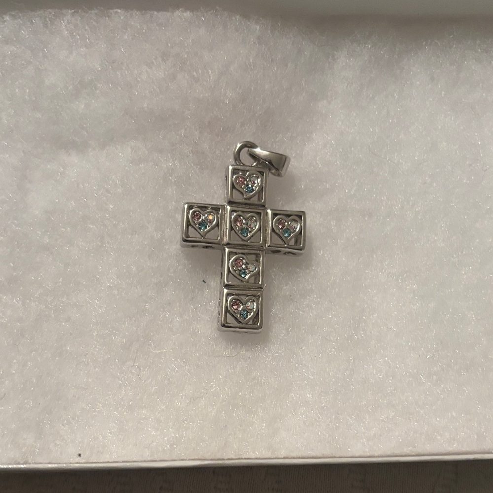 Elegant Silver Cross Pendant with Heart Accents